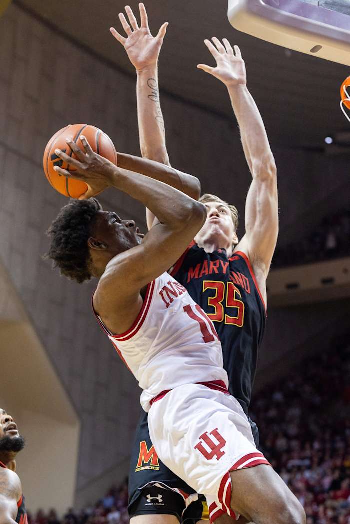 Indiana Hoosiers forward Kaleb Banks (10) shoots the ball against Maryland Terrapins center Caelum Swanton-Rodger (35) on defense at Simon Skjodt Assembly Hall.